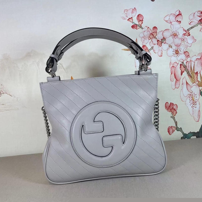 G*u*i top handle bags